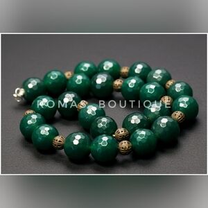 Green stone and silver tone necklace
